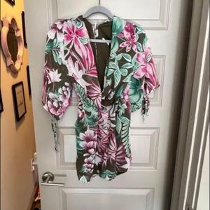 Womens green floral romper. Size S.